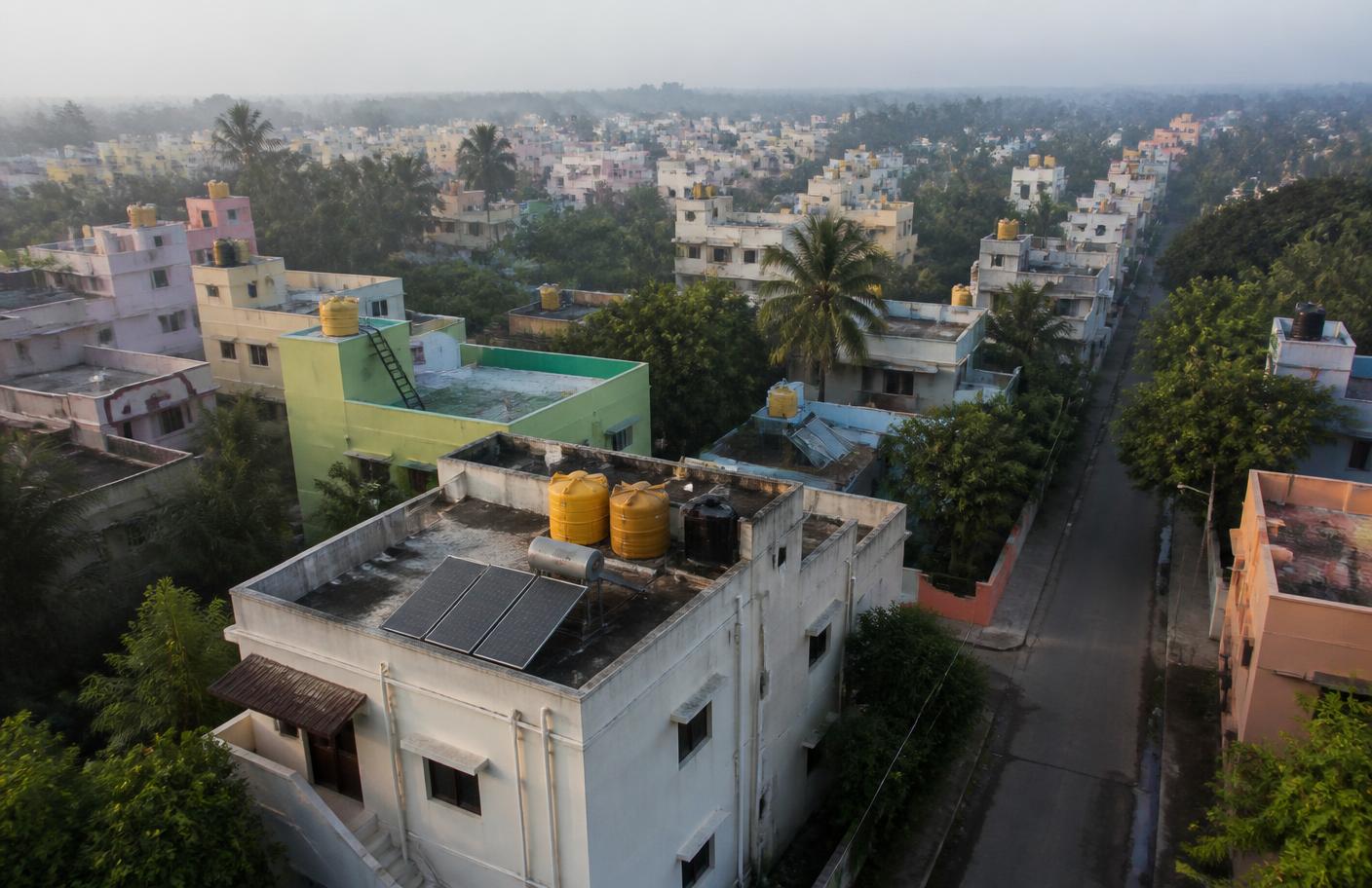 Rooftops with water tanks and solar water heaters in a South Indian neighbourhood